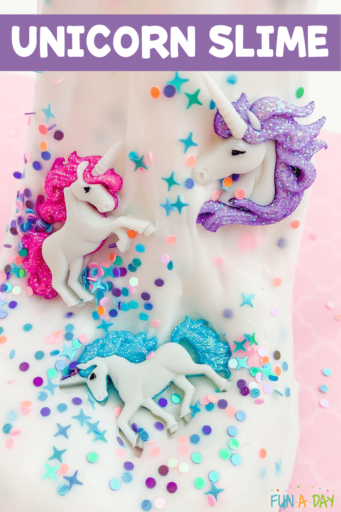 Unicorn buttons on top of white slime with whimsical glitter. Text that reads unicorn slime.