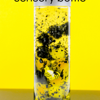 Bee sensory bottle with text that reads busy bee sensory bottle.