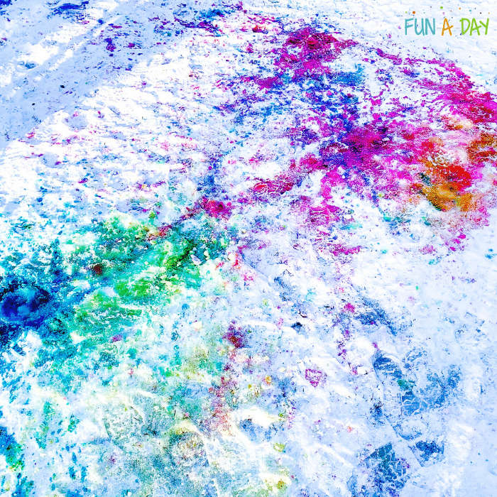The colorful results of kids' painting in the snow with water balloons