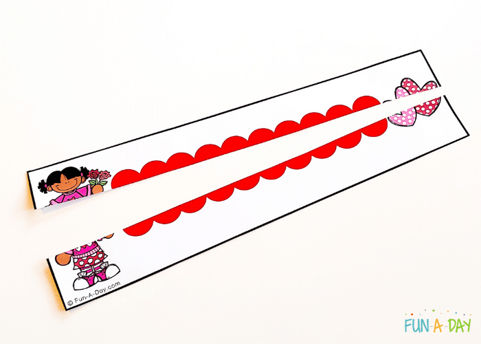 valentine cutting strip with red dots stickers cut in half