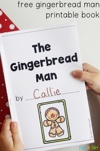 preschooler holding the gingerbread man printable with text that reads free gingerbread man printable book