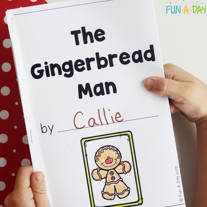 preschool child holding the gingerbread man printable book