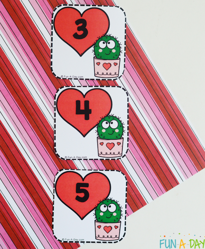 3 number cards from a set of Valentine calendar numbers for preschool