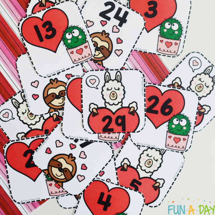 pile of paper valentine number cards for preschool math