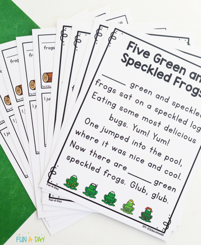 pile of printables showing 5 green and speckled frogs rhyme and sequence cards