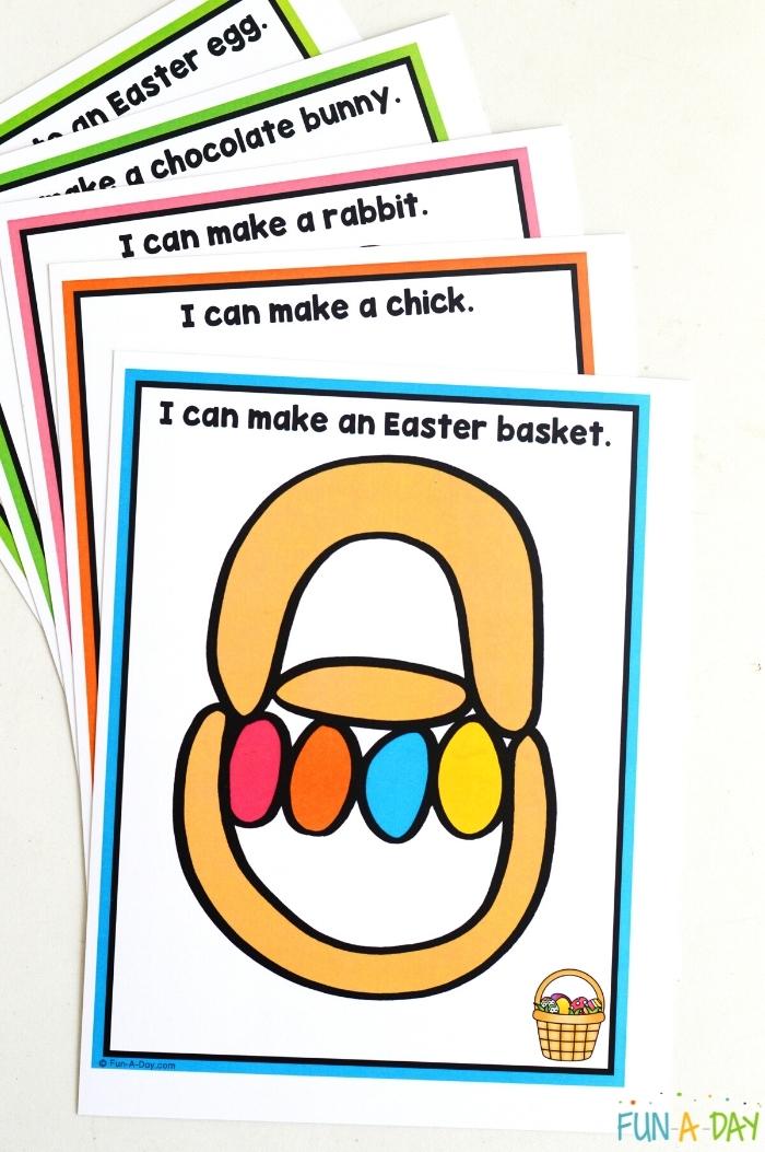 stack of printed Easter playdough mats for preschoolers