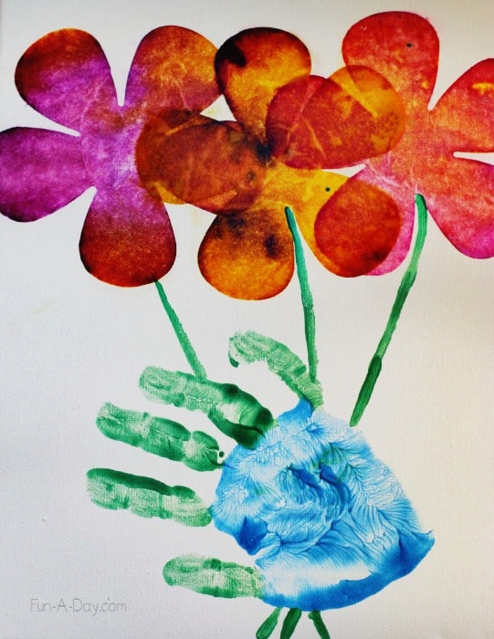 preschool Mother's Day handprint art project with painted handprint and painted flowers