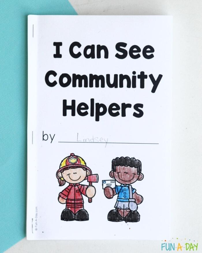 cover of printable book with words: I can see community helpers