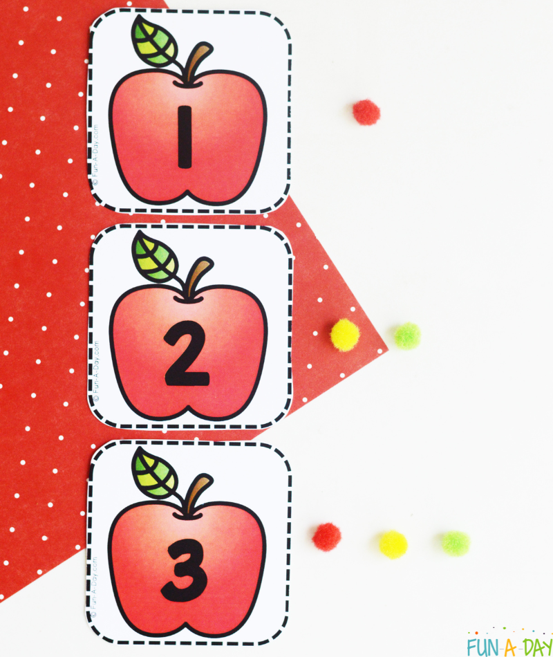 1, 2, and 3 apple calendar numbers with pom poms