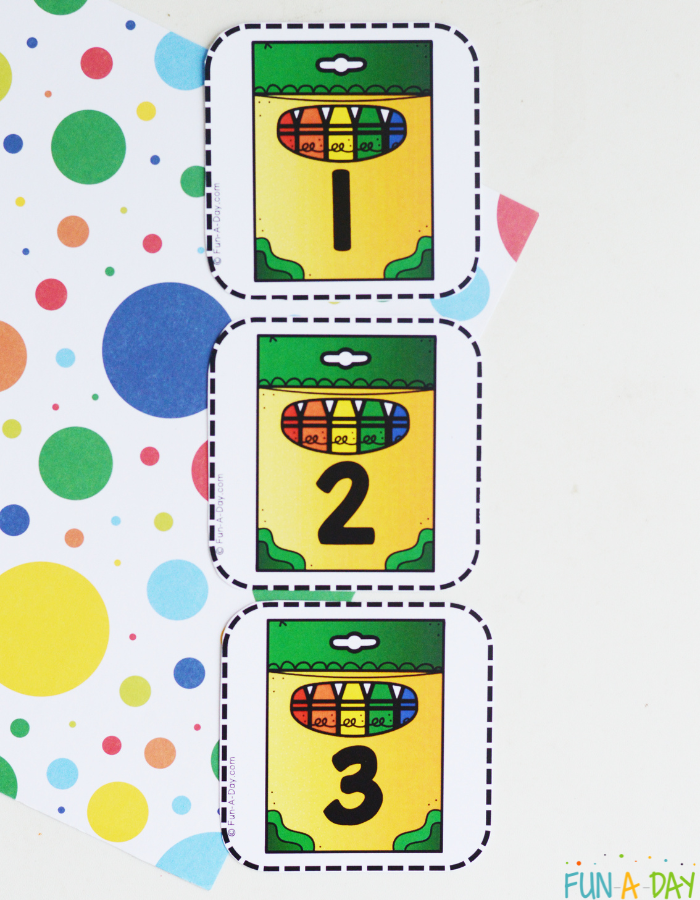 Crayon number cards 1, 2, and 3 in a vertical ine