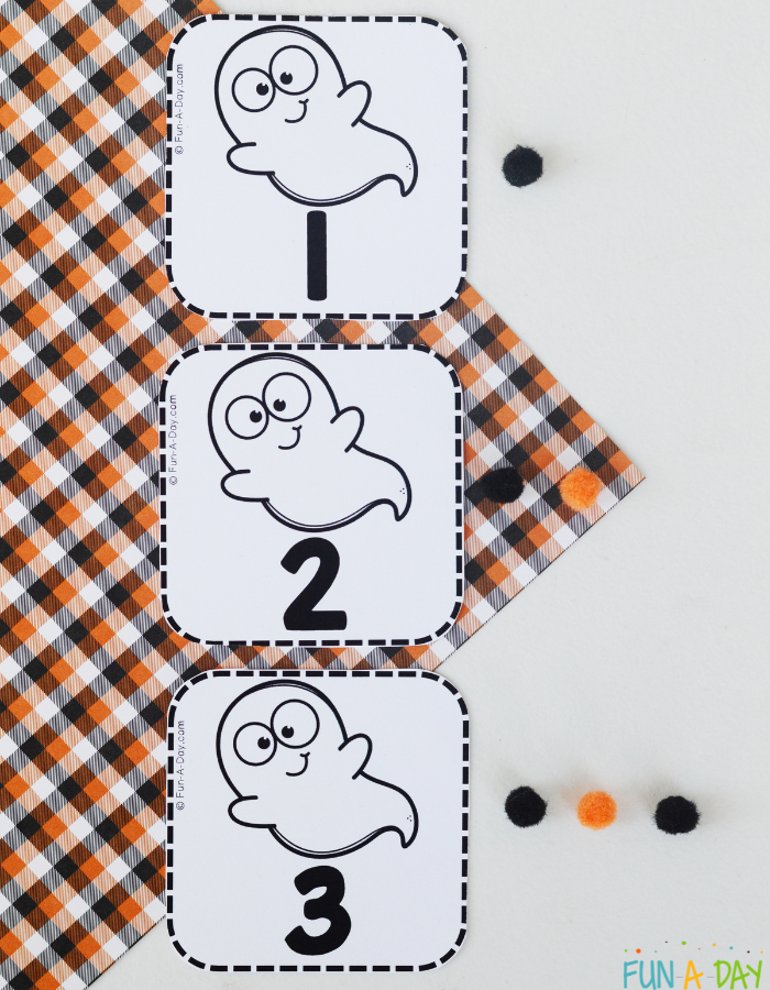 ghost number cards 1, 2, and 3 with corresponding number of small pompoms