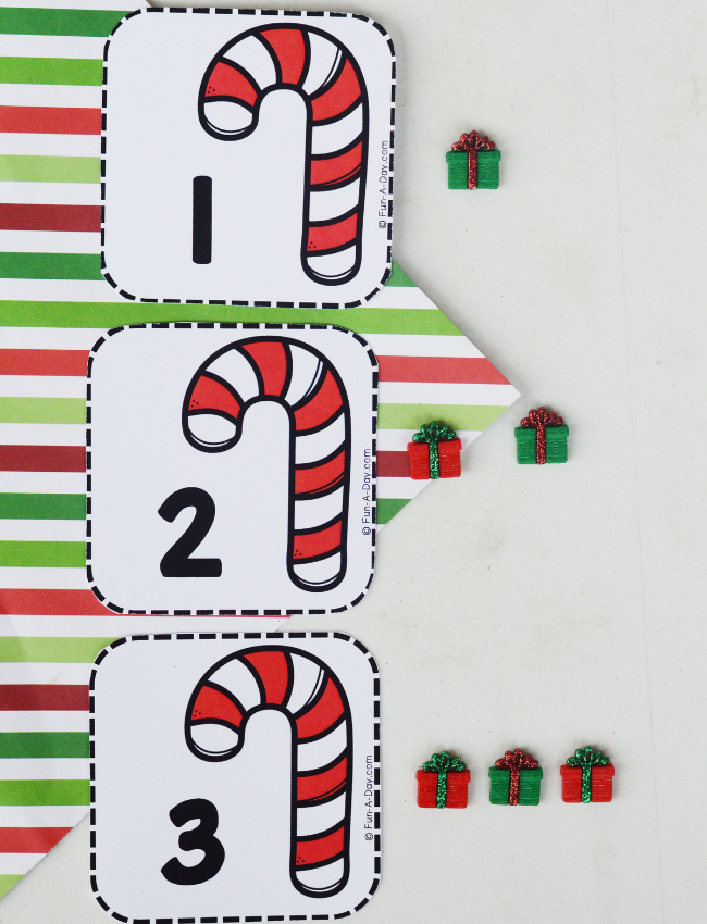 candy cane calendar numbers 1, 2, and 3 with corresponding number of buttons next to each card