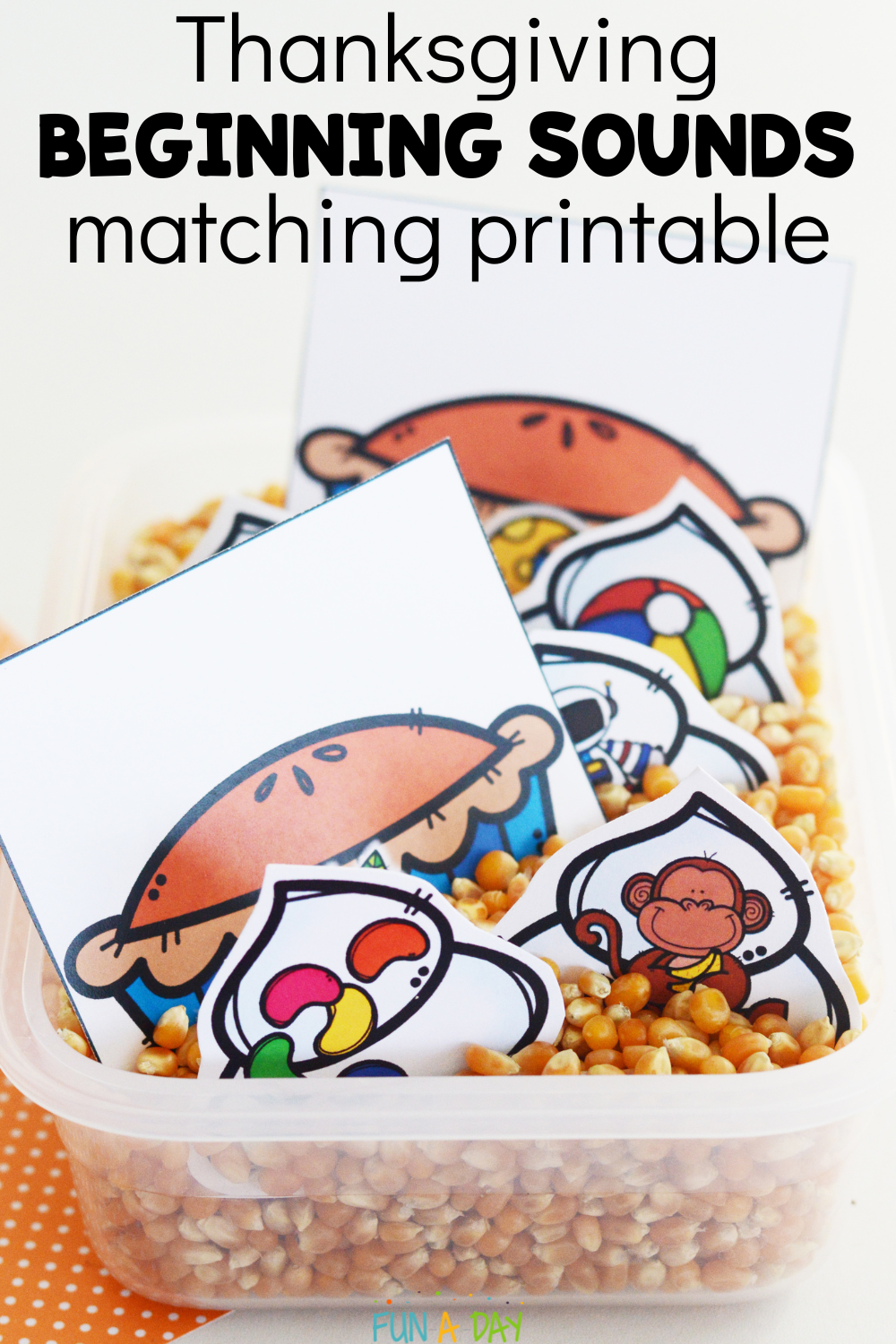 picture cards in bin of corn with text that reads thanksgiving beginning sounds matching printable
