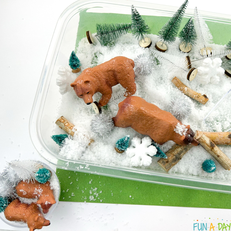 insta snow sensory bin with a bear theme