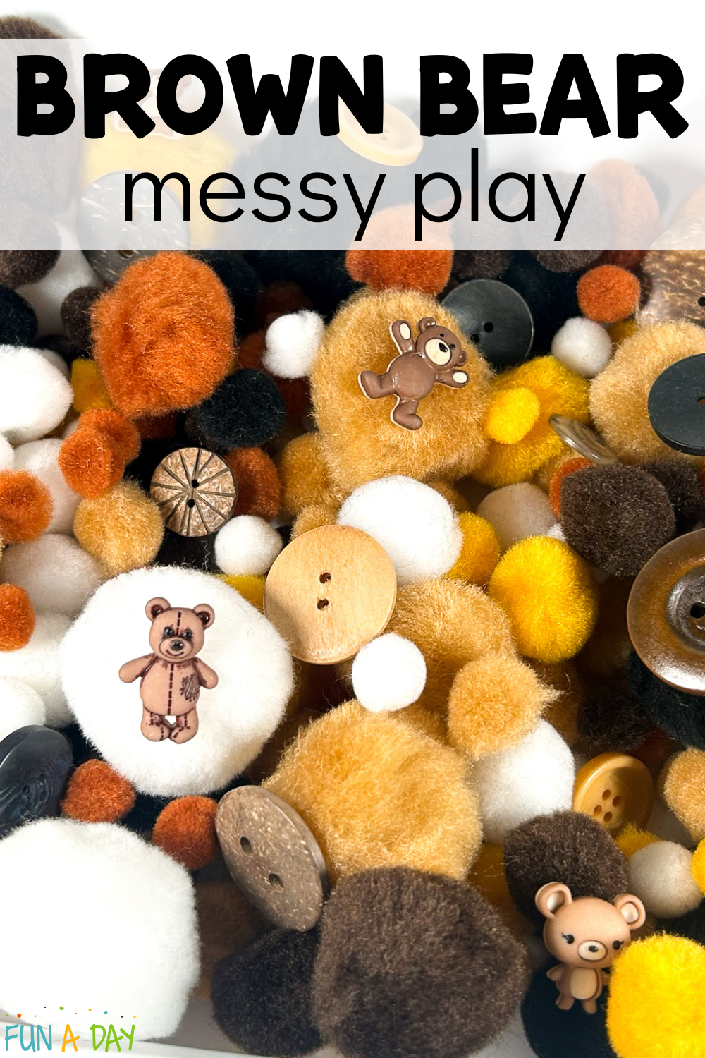 Close up of pompom and button sensory bin with text that reads brown bear messy play