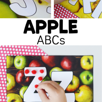 Preschooler using alphabet printable mats with text that reads apple ABCs