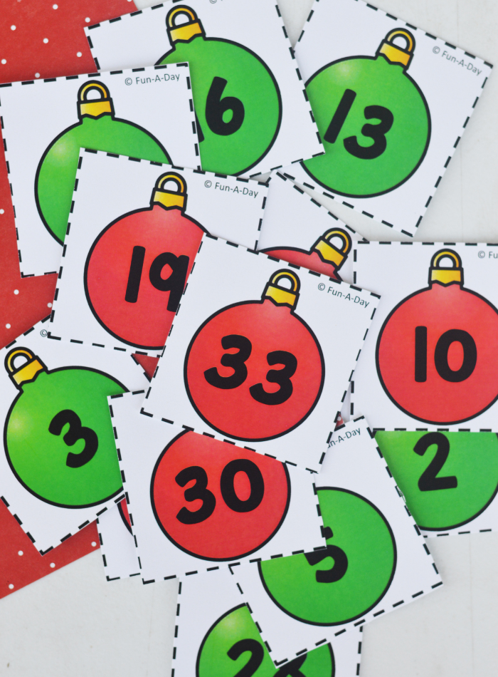 pile of red and green ornament calendar numbers in disarray