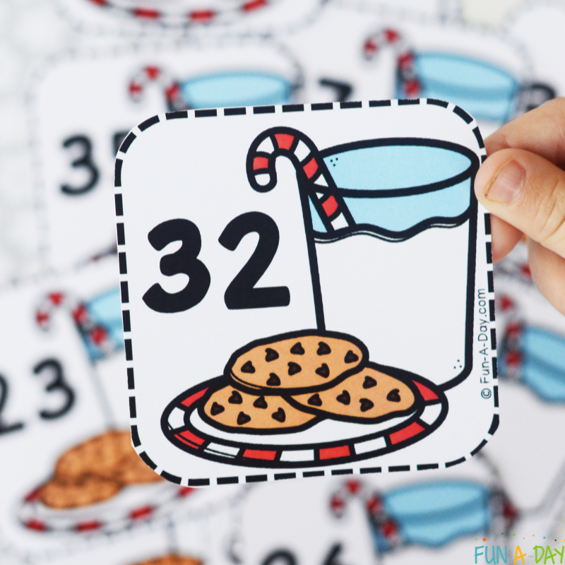 Number 32 Milk and cookies calendar numbers with other calendar numbers splayed out in the background.
