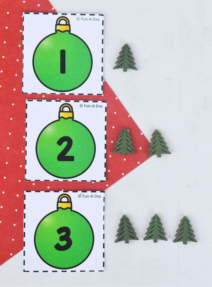 ornament calendar numbers 1, 2, and 3 with corresponding number of tree manipulatives by each card