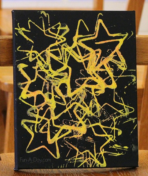 night sky canvas art made by preschoolers with glow in the dark stars