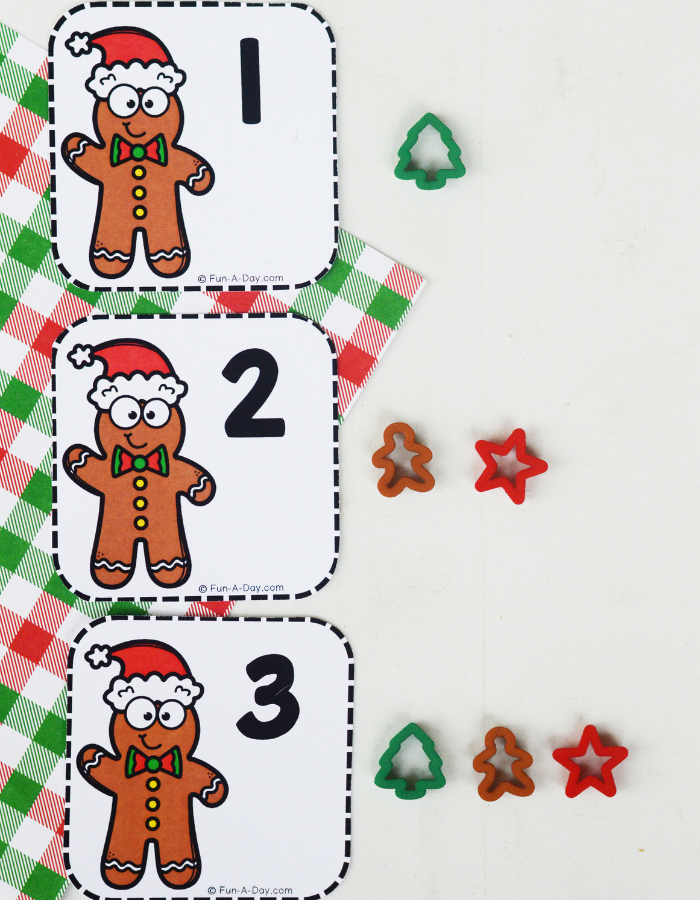 gingerbread man calendar numbers 1, 2, and 3 with coordinating number of manipulatives