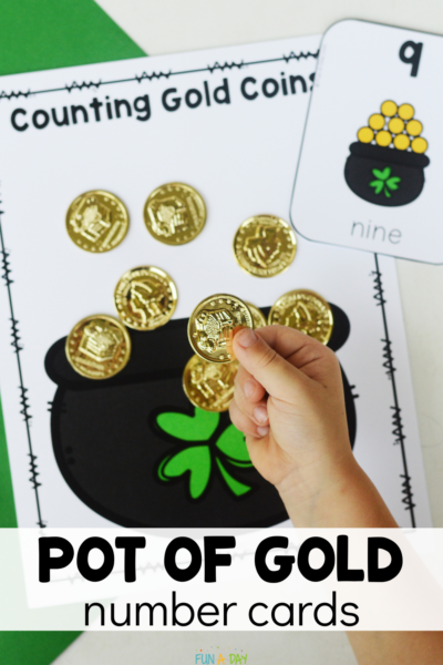 Child using gold coins on St. Patrick's Day printable with text that reads pot of gold number cards