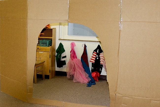cardboard castle in preschool dramatic play center before it was painted