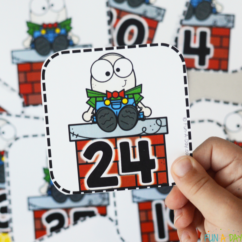 child holding up humpty dumpty calendar number 24