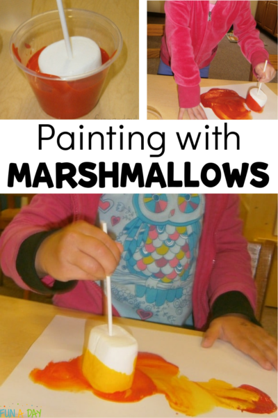 kids making art during camping theme with text that reads painting with marshmallows