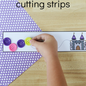 child placing buttons on fine motor printable with text that reads castle cutting strips